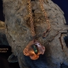 Open fire forged copper flower pendant