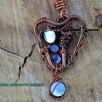 Heart shaped copper pendant