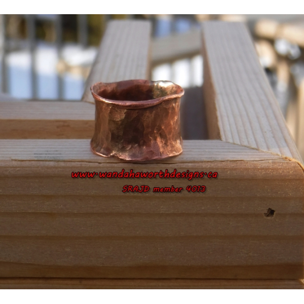 Solid forged copper ribbon ring