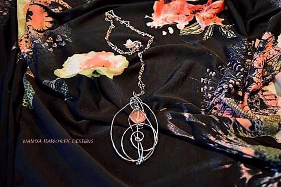strawberry_quartz_heart_and_stainless_steel_pendant_1.jpg