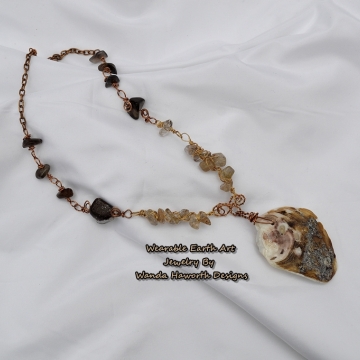 Sea shell pendant necklace , Rutilated and smokey quartz accent stones , Antique copper chain , Gold anodized wire ,Antique copper wire