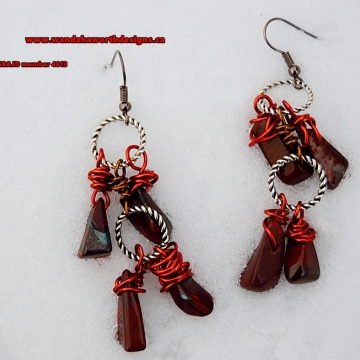 South African Red Tigers Eye Earrings Hand Wired With Antique Copper Wire Joined Together With Twisted Pewter Hoops The Hooks Are Stainless